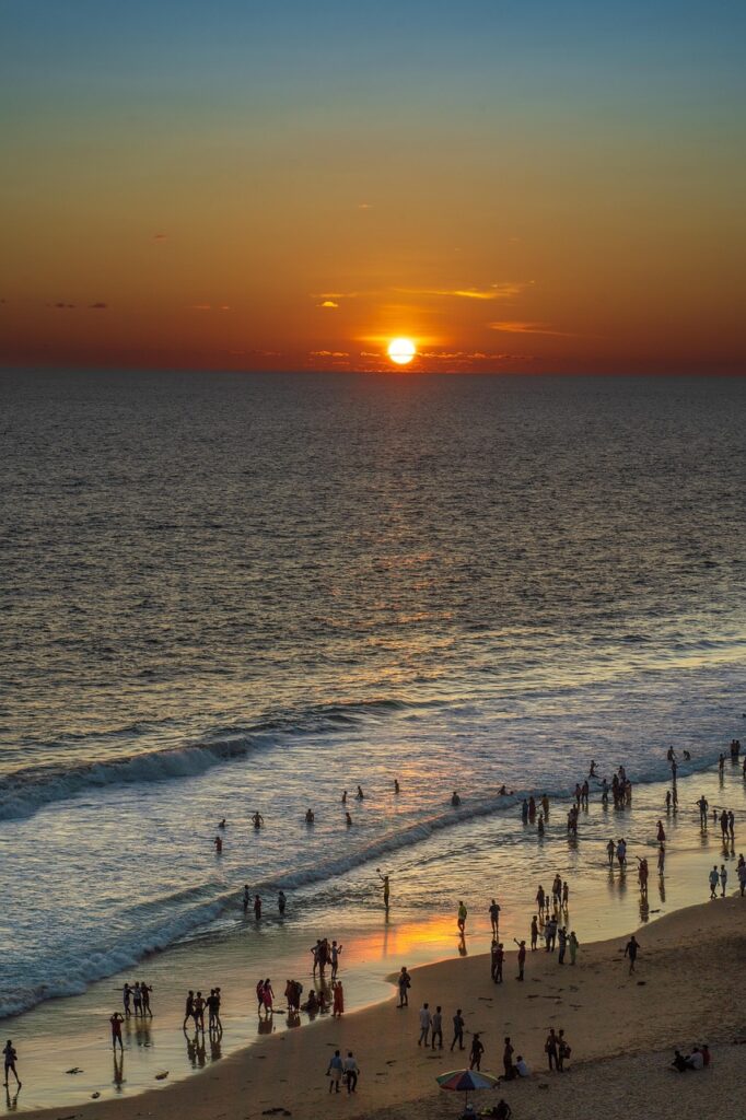 beach, sea, sunset, coast, people, tourism, crowd, golden sunset, water, sand, coastline, seashore, waves, horizon, seascape, nature, scenery, evening, kerala, kerala tourism, varkala